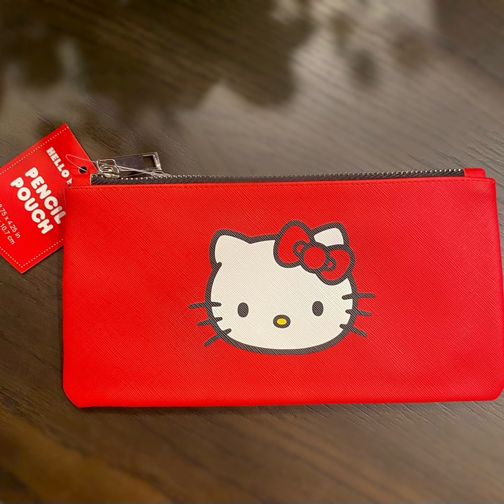 New hello kitty pencil pouch. Can also be used as a small makeup bag